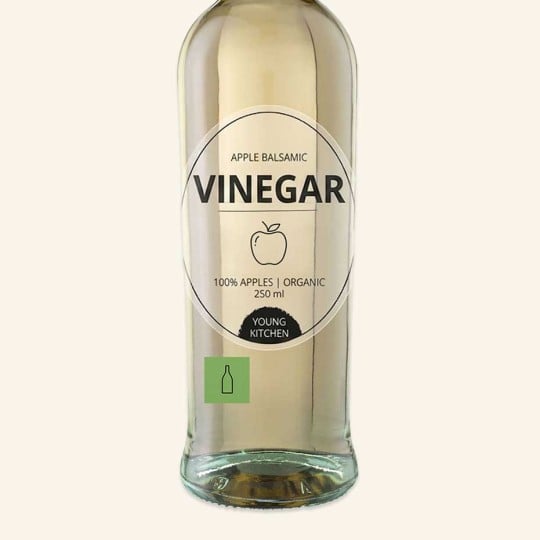 Eine Essig-Flasche mit Etikett.