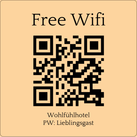Auf dem quadratischen Aufkleber ist ein QR Code und dem Text "Free Wifi".