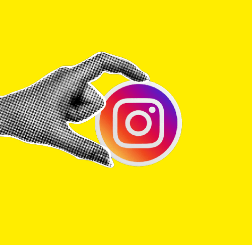 Hand die Ein Instagram Logo zeigt