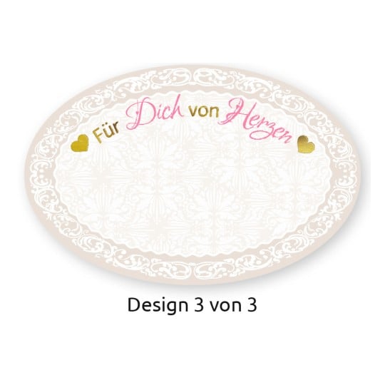 Das Bild zeigt ein ovales dekoratives Design mit dem Text 'Für Dich von Herzen' in Pink und Gold, umgeben von einem komplizierten weißen Muster auf einem hellen Hintergrund. Es enthält auch die Beschriftung 'Design 3 von 3'.