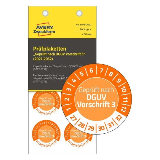 Das Bild zeigt ein Paket mit Prüfetiketten, beschriftet mit 'Geprüft nach DGUV Vorschrift 3'. Das Paket enthält runde Etiketten mit einem Durchmesser von 30mm, auf denen Zahlen für verschiedene Monate angezeigt werden.