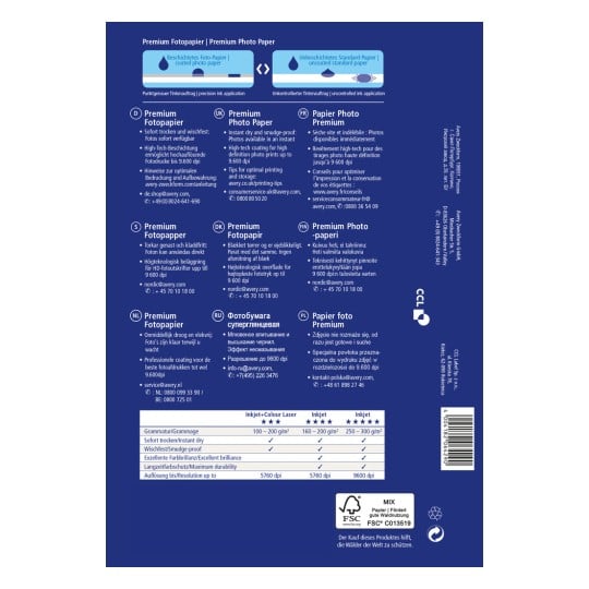 Das Bild zeigt eine Packung mit Premium-Fotopapier mit Spezifikationen und Tipps für optimales Drucken. Es enthält Informationen in mehreren Sprachen über die Qualität und Eigenschaften des Papiers, wie sofortiges Trocknen und hochauflösende Druckfähigkeiten.
