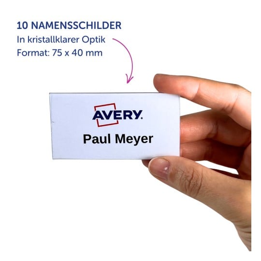 Hand, die ein weißes Avery-Namensschild hält, auf dem „Paul Meyer“ gedruckt ist?