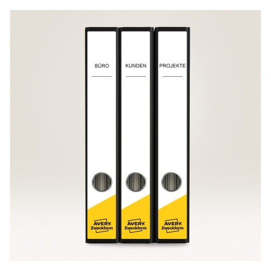The image displays three black binders labeled 'BÜRO', 'KUNDEN', and 'PROJEKTE' with a yellow design at the bottom.