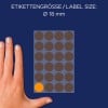 Größenvergleich mit Hand, Artikel: 3173, ein Bogen Markierungspunkte, Format: ⌀ 18 mm, Farbe: neonorange