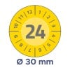 Das Bild zeigt ein kreisförmiges gelbes Messzifferblatt mit den Zahlen 1 bis 12 am Rand. Die zentrale Zahl, die angezeigt wird, ist 24, und sie weist auf einen Durchmesser von 30 mm unten hin.
