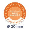 Das Bild zeigt eine kreisförmige Anzeige, die mit den Zahlen 1 bis 12 und 27 bis 32 markiert ist, mit der Aufschrift 'Geprüft nach DGUV Vorschrift 3' und einem Durchmesser von 20 mm.