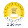 Das Bild zeigt eine kreisförmige Skala mit Zahlen von 1 bis 12 und einem Durchmesser von Ø 30 mm. Es enthält den Text 'Geprüft gem. VDE' und zusätzliche Zahlen von 24 bis 29 am Rand.