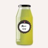 Eine Glasflasche mit einer grünen Flüssigkeit, die mit 'Minz-Sirup' beschriftet ist.
